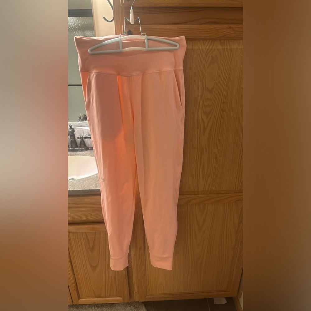 Pink under armour joggers.